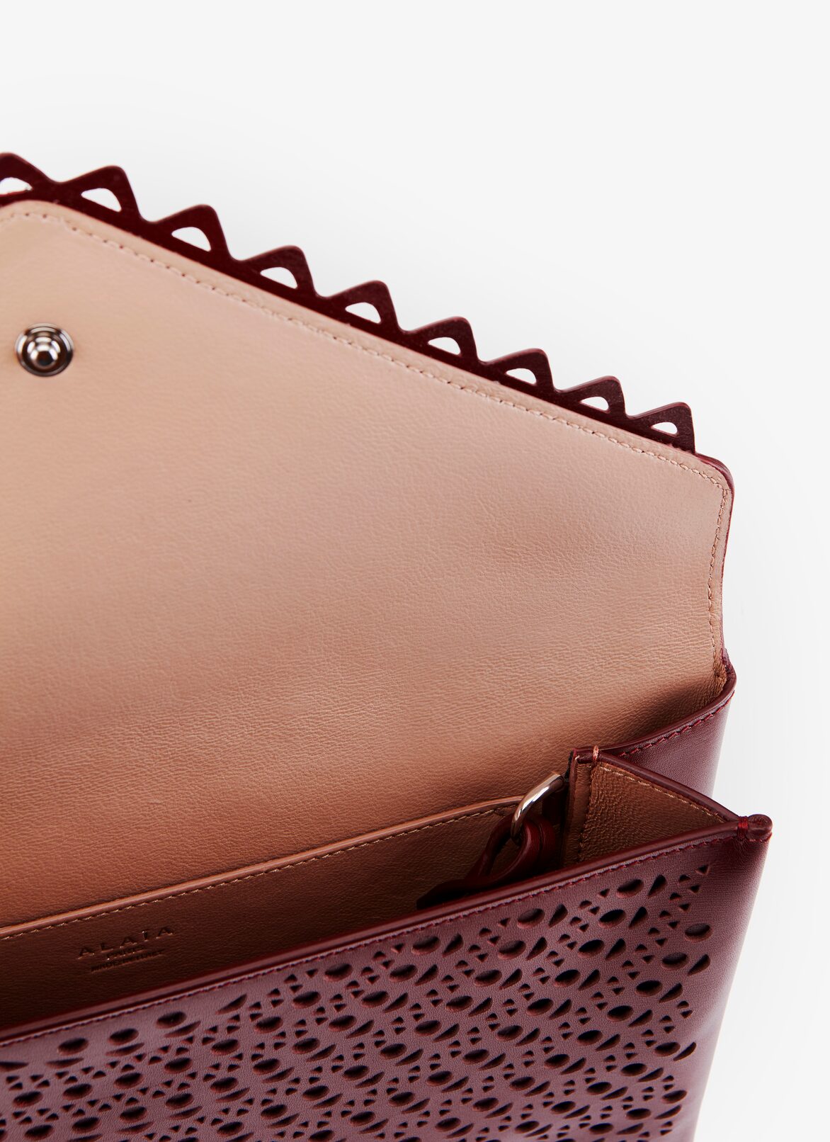 POCHETTE CUIR LUX MINI NEW VIENNE GRENAT ALAÏA  POCHETTE CUIR LUX MINI NEW VIENNE GRENAT ROUGE GRENAT